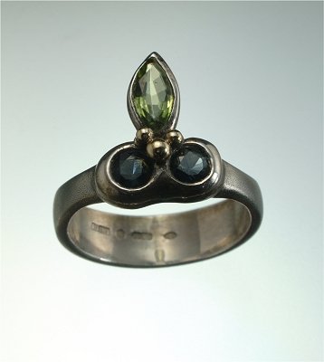 English renaissance silver & gold green sapphire, peridot ring